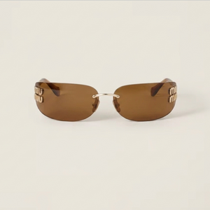 Miu Miu Eyewear With Vertical Gold Logo Temples