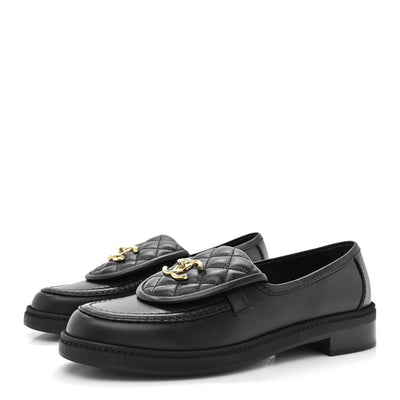 Chanel Quilted Leather Turnlock Loafers In Black Leather