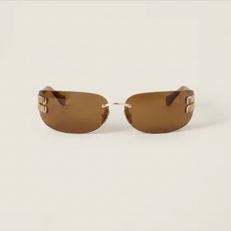 Miu Miu Eyewear With Vertical Gold Logo Temples 1