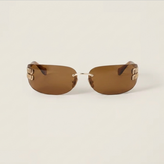 Miu Miu Eyewear With Vertical Gold Logo Temples