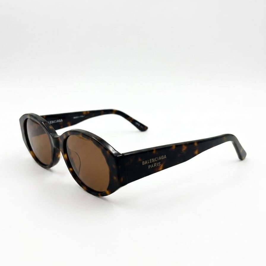 Balenciaga Eyewear Sunglasses With An Oval Frame And Tortoiseshell Effect 2