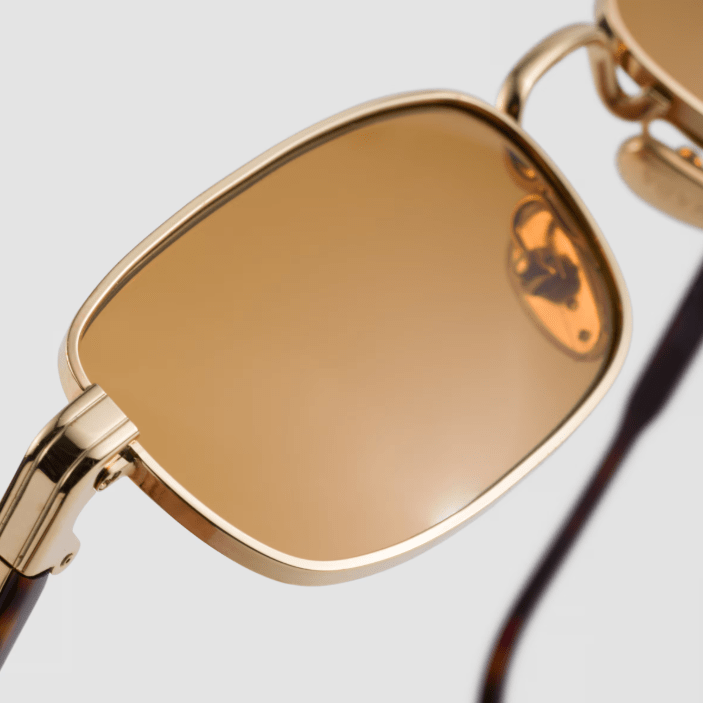 Prada Sunglasses With The Iconic Metal Plaque 5