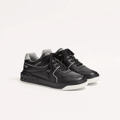 Valentino One Stud Low-Top Nappa Sneaker For Man in Black/Grey